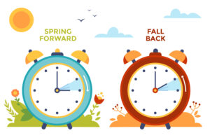 One clock showing the new clock face time for daylight savings in the spring, the other clock showing the change for the fall.